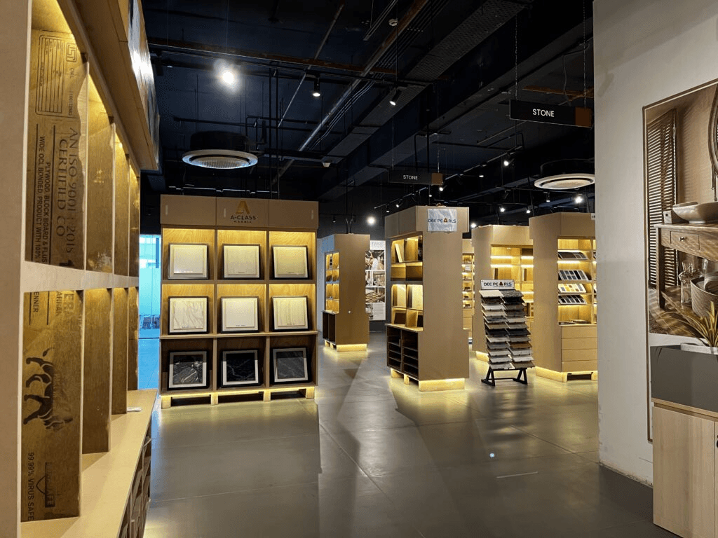 Material library shelves at Knowledge Center, Gurugram, with 120 brand samples